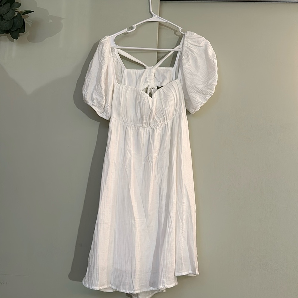 This is a never worn, size 12, Princess Polly white mini dress.